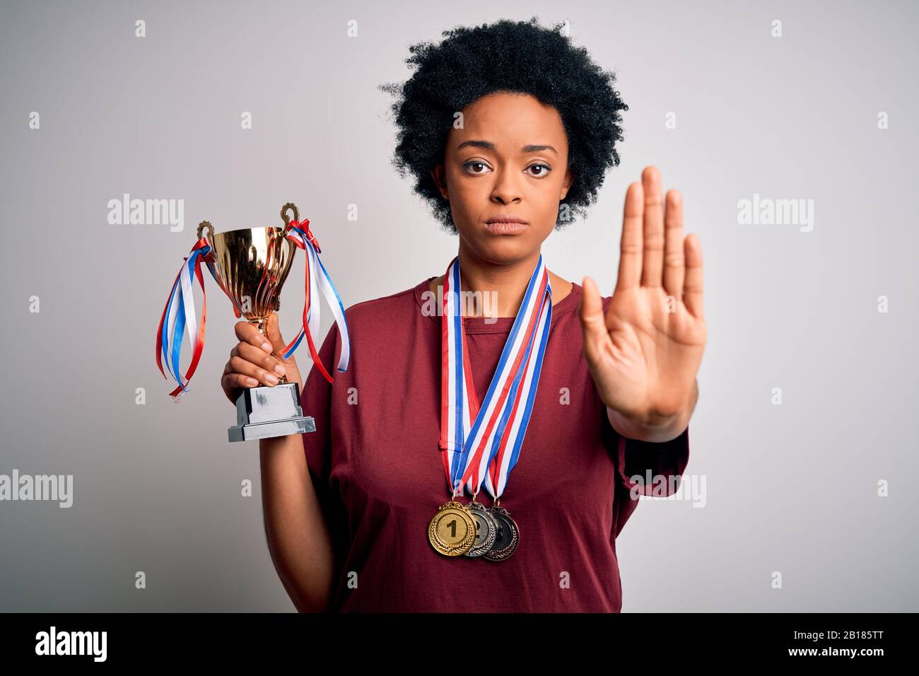 Young African American afro athlete woman with curly hair wearing
