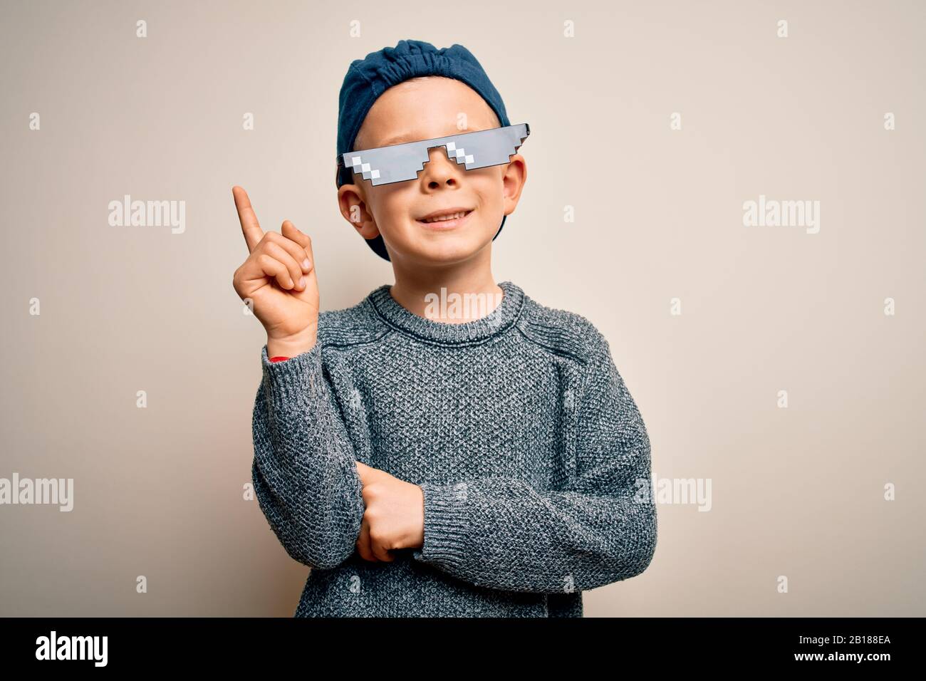 Young Little Caucasian Kid Wearing Internet Meme Thug Life Glasses Over Isolated Background With A Big Smile On Face Pointing With Hand And Finger To Stock Photo Alamy