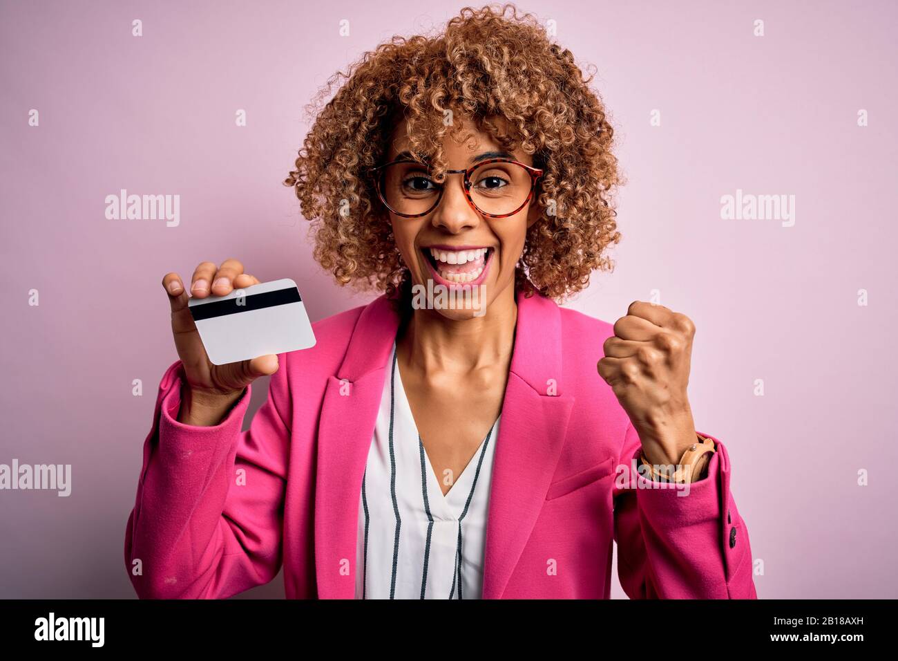 Young african american business woman holding id card identification