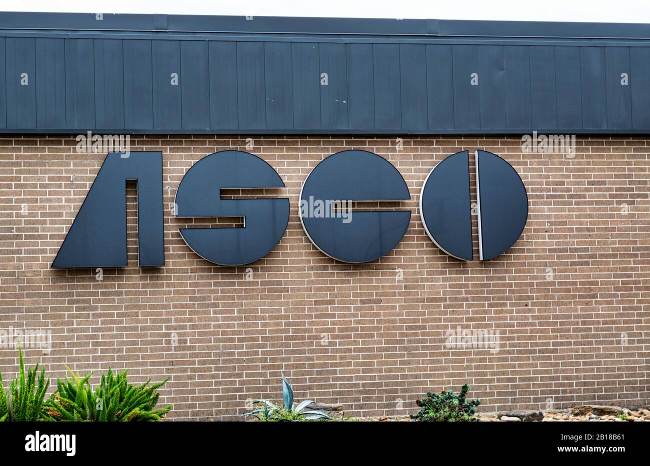 ASCO Equipment Company sign on building exterior in Houston, TX. Heavy machinery equipment and parts sales and rental business. Stock Photo