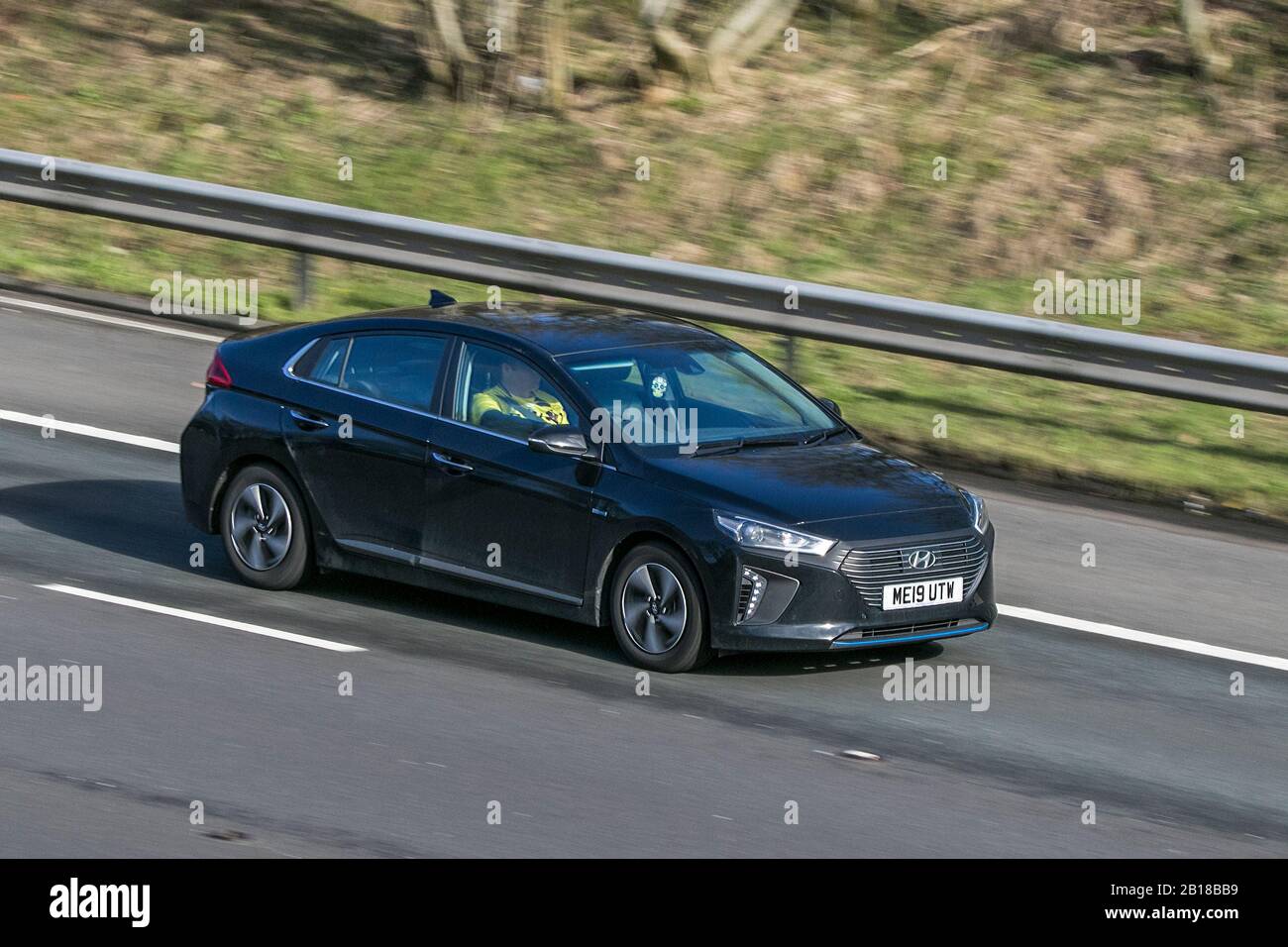 Hyundai ionic black Hybrid Electric car driving on the M6 motorway near ...