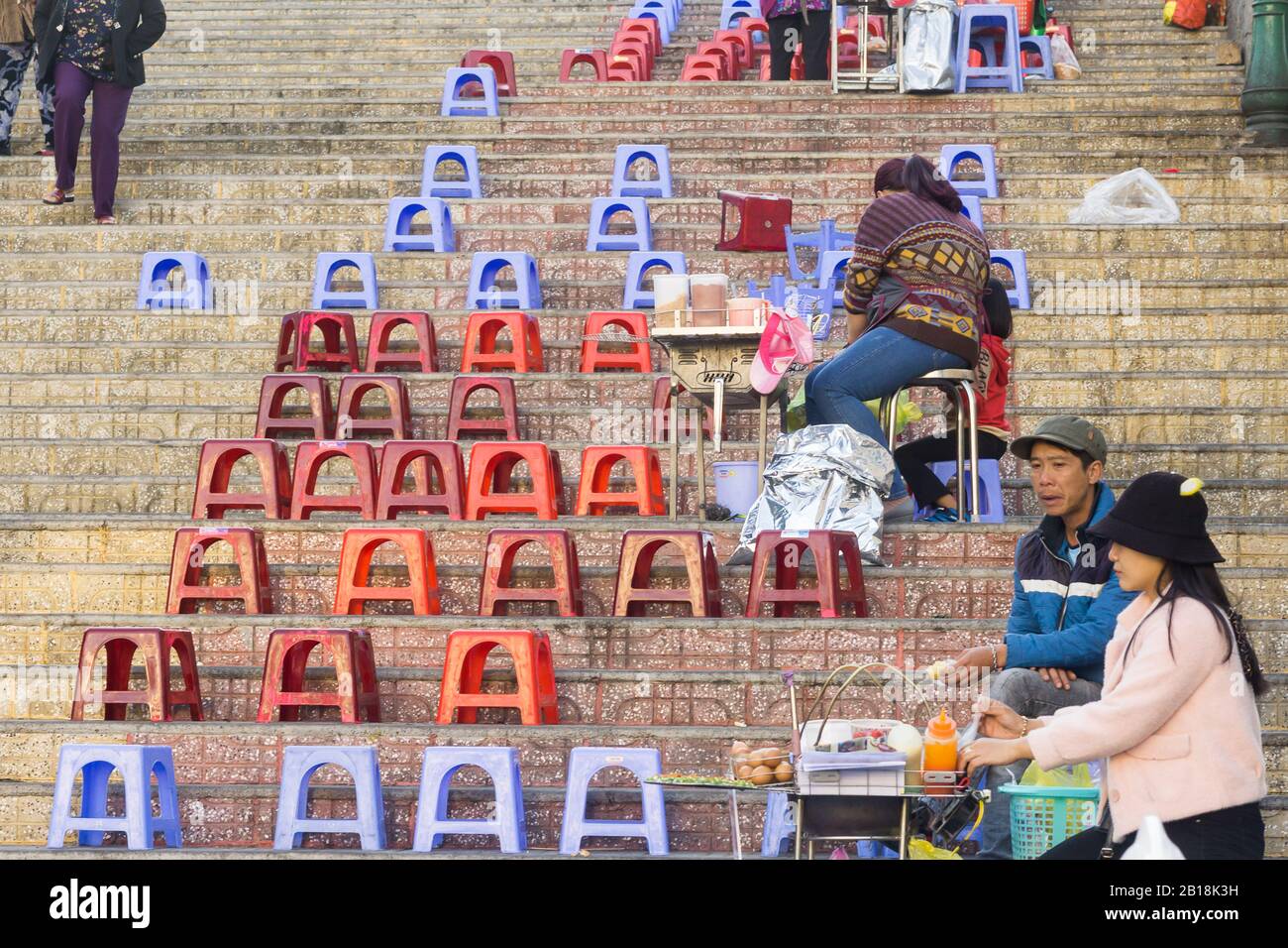 Dalat Vietnam - Street vendors waiting for customers in Dalat, Vietnam, Southeast Asia. Stock Photo