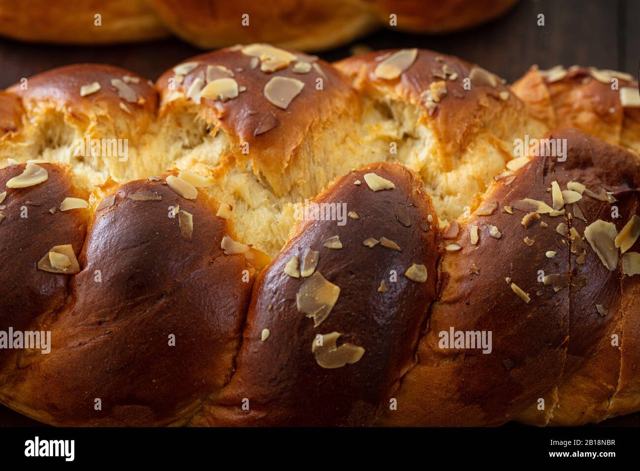 Sweet bread, easter tsoureki cozonac background, closeup view. Braided