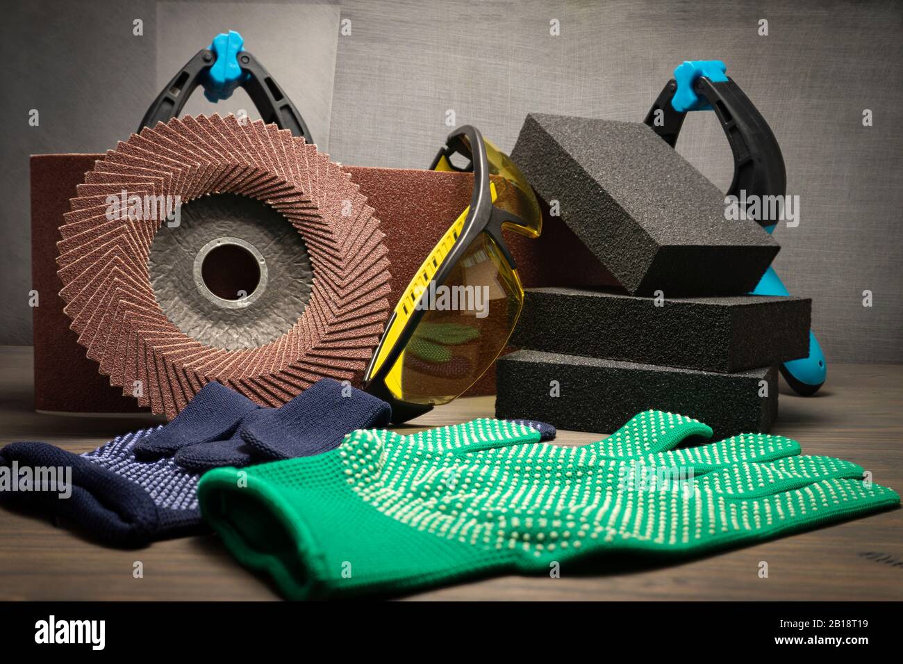 Different tools for sanding sanding belt, clamps, abrasive sponge and