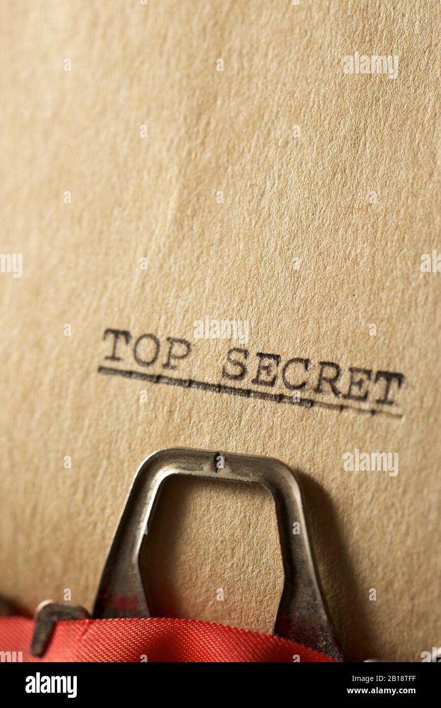The sentence, Top Secret, written with a typewriter Stock Photo - Alamy