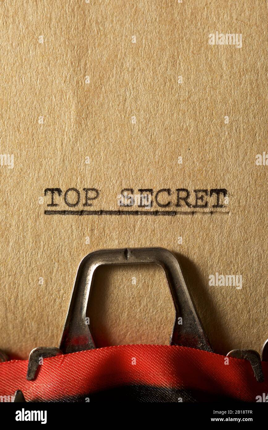 The sentence, Top Secret, written with a typewriter Stock Photo - Alamy