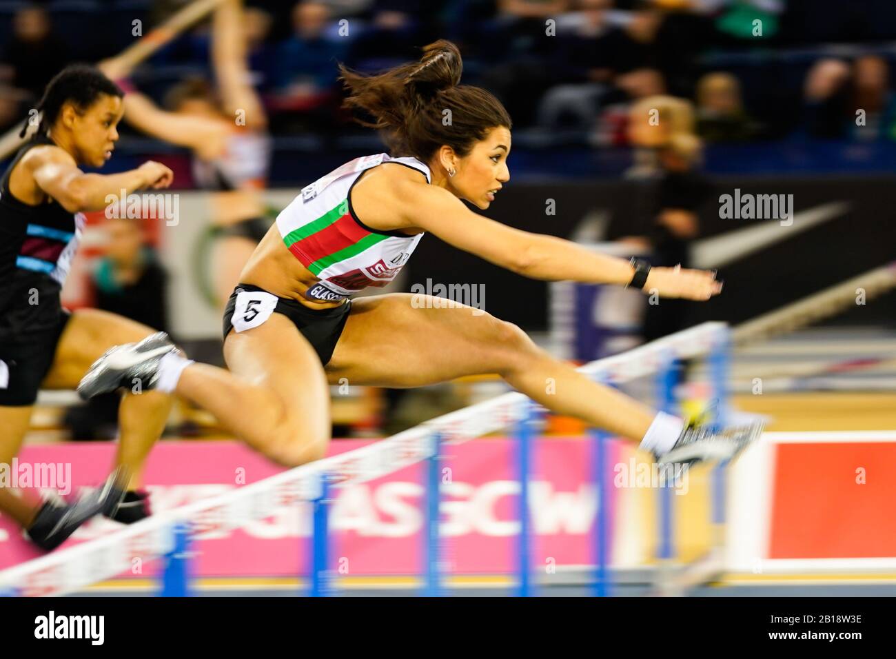 Glasgow, UK. 22nd Feb, 2020. Yasmin Miller leads over the final hurdle