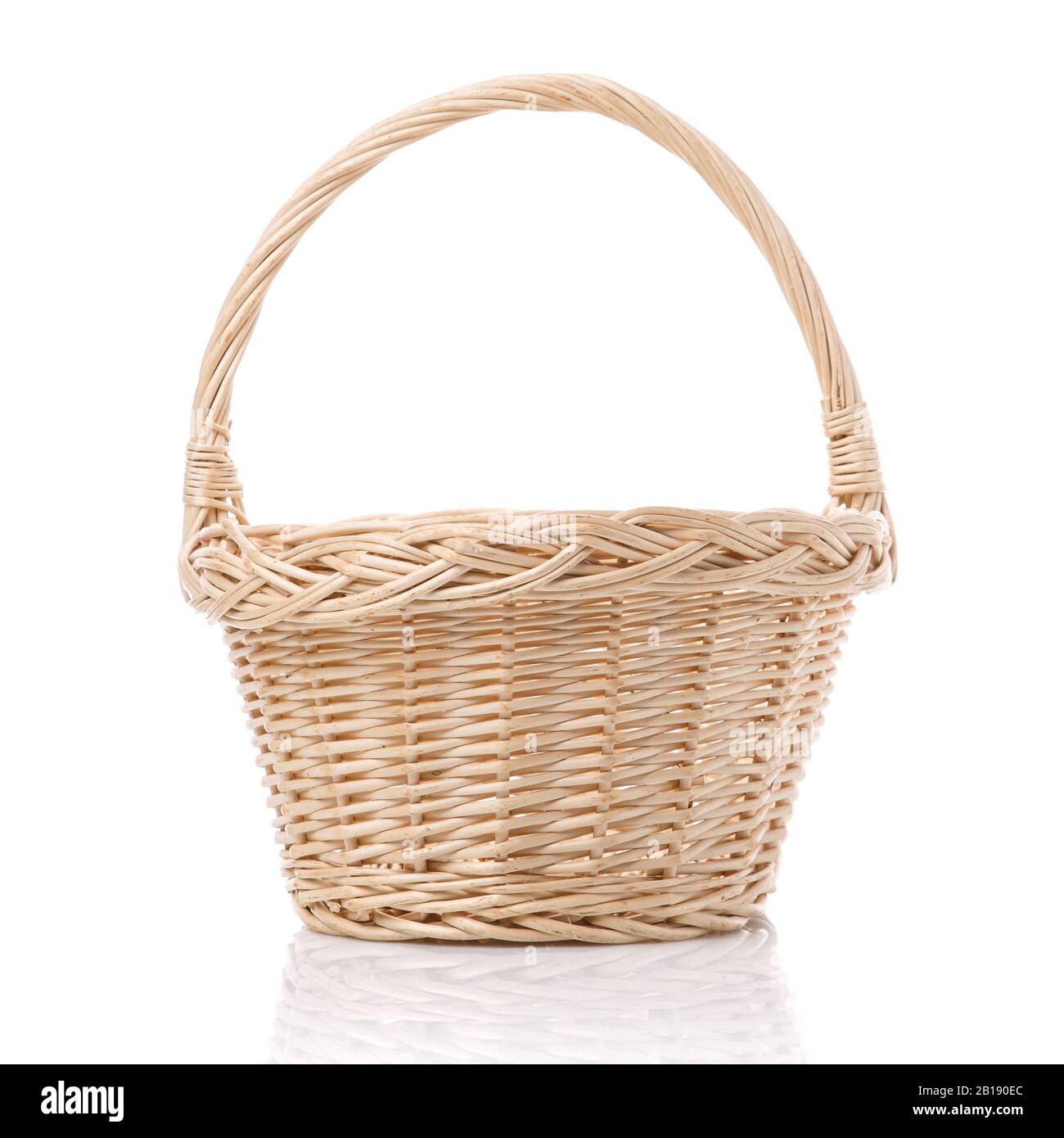 Rustic wicker basket isolated on white background Stock Photo - Alamy
