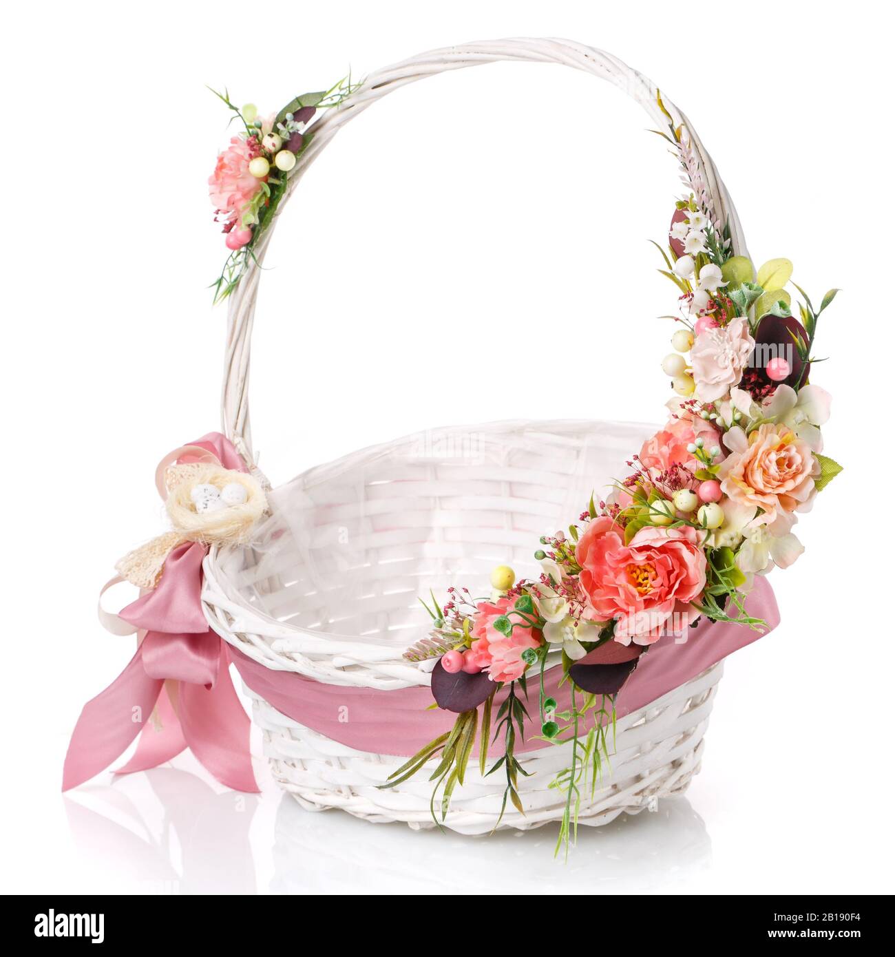 Wicker design baskets are decorated with a floral arrangement for Easter  Stock Photo - Alamy