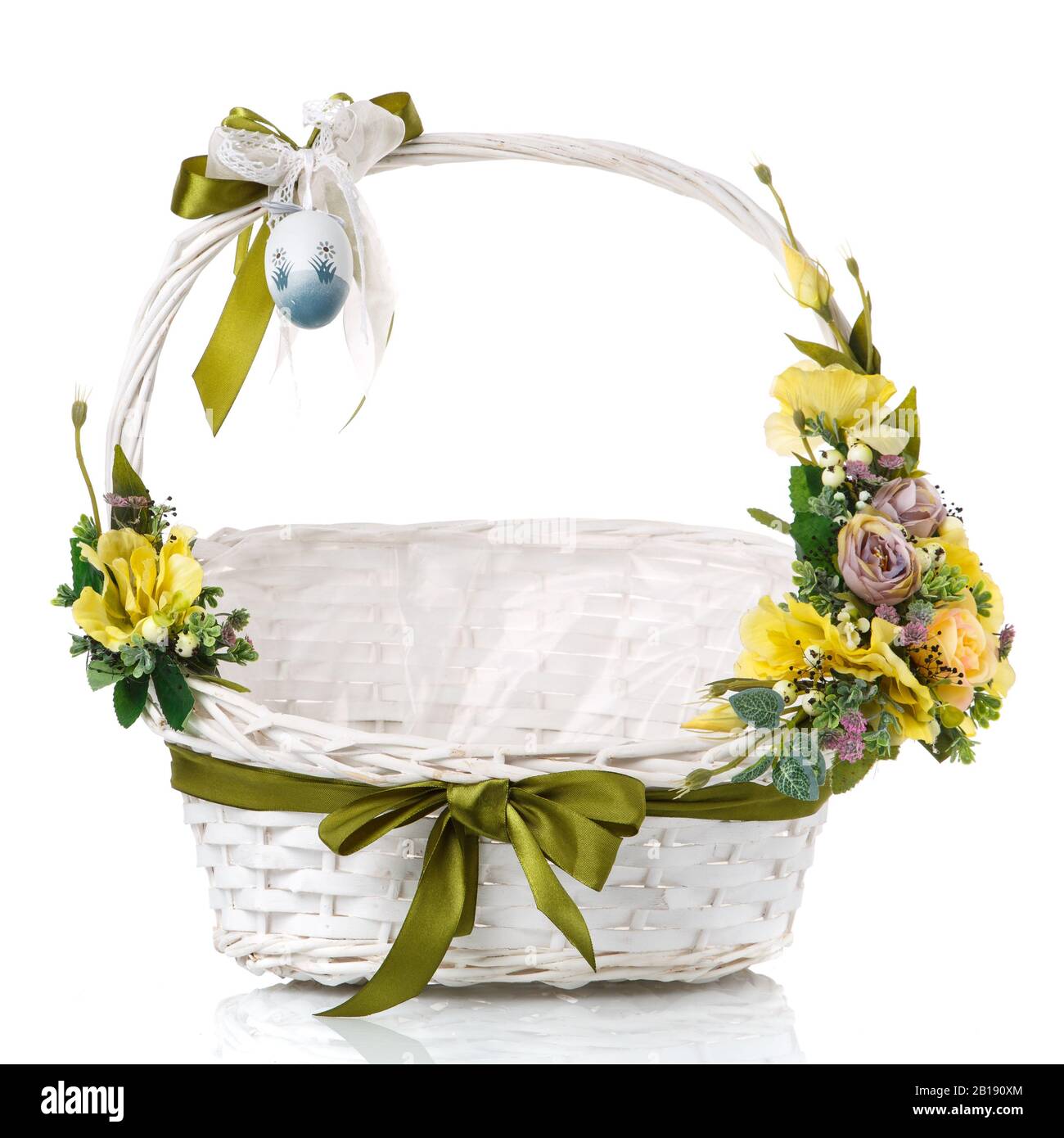 Wicker basket decorated with flowers on white background Stock Photo ...