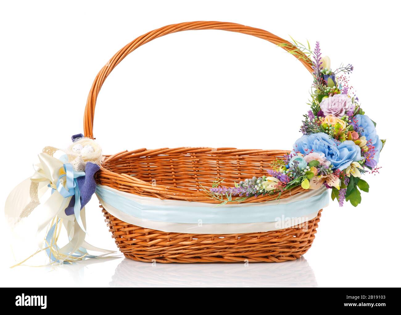 Wicker design baskets are decorated with a floral arrangement for