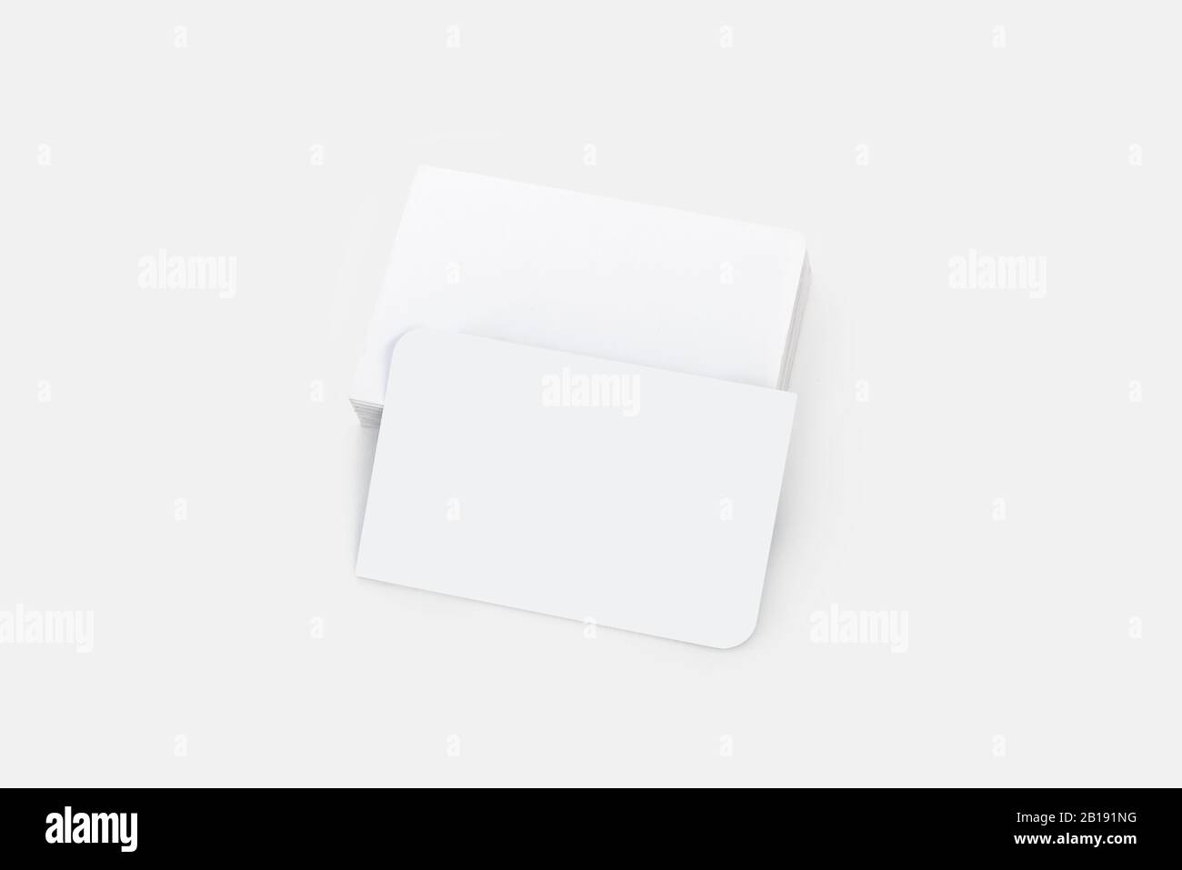 A pile of empty business card for mock up isolated on white Stock Photo