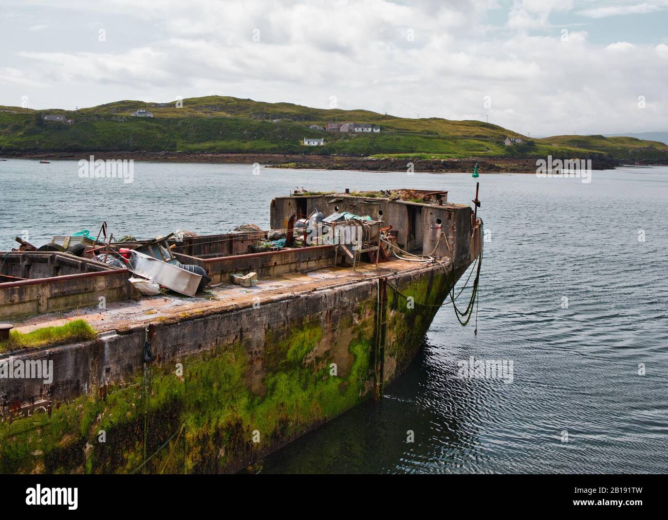 Concrete barge ship Cretetree now abandoned on the Isle of Scalpay, Outer Hebrides, Scotland Stock Photo