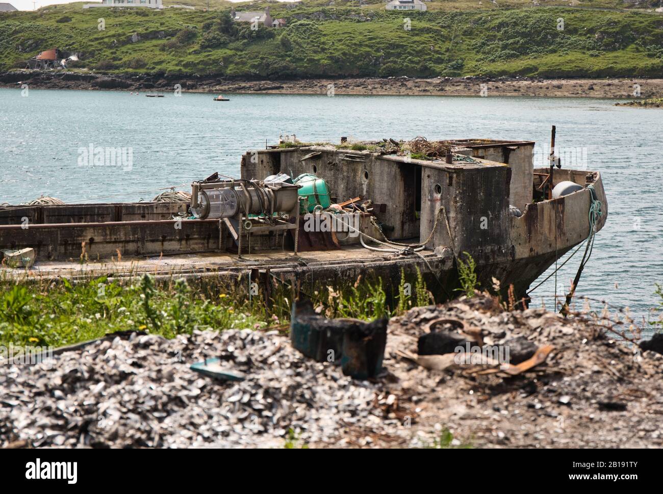Concrete barge ship Cretetree now abandoned on the Isle of Scalpay, Outer Hebrides, Scotland Stock Photo