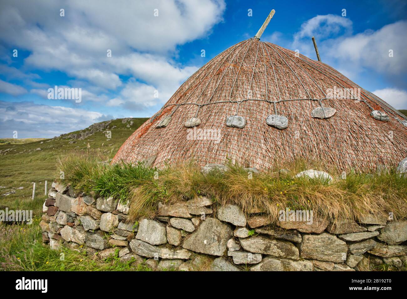 Reconstructed Iron Age house, Bostadh, Great Bernera, Isle of Lewis, Outer Hebrides, Scotland Stock Photo