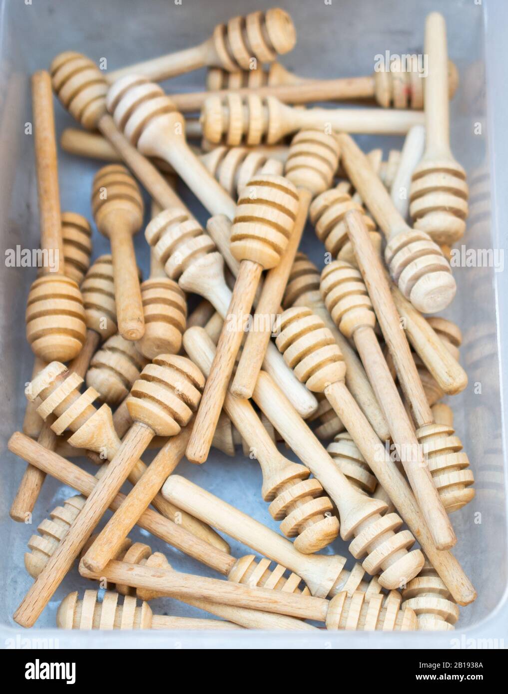 Set of honey dippers made of wood Stock Photo Alamy