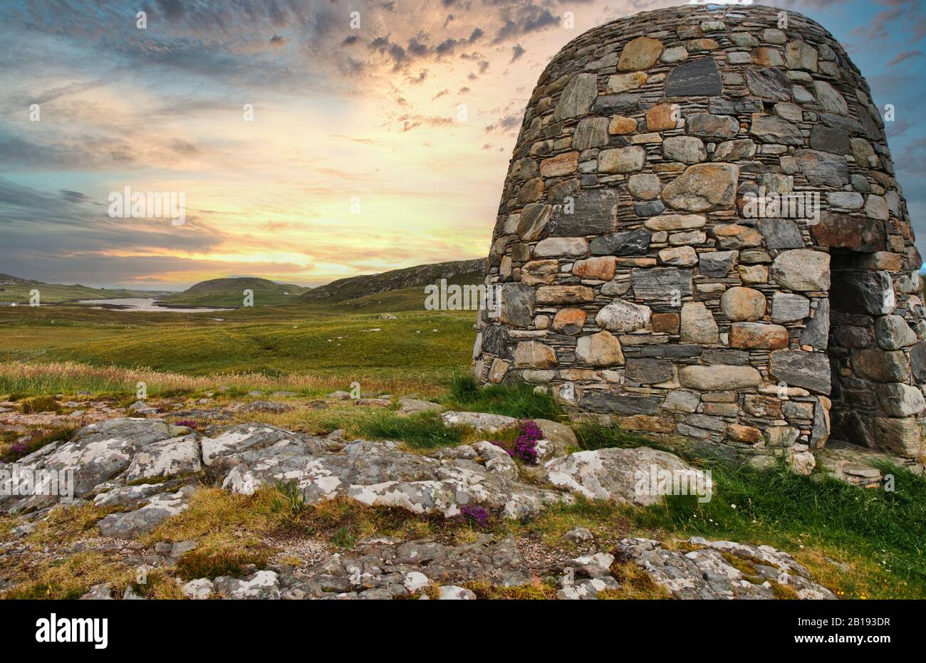Pairc Deer Raiders Memorial, a stone cairn set in a stunning and remote landscape on the Outer Hebridean island of Lewis, Scotland Stock Photo