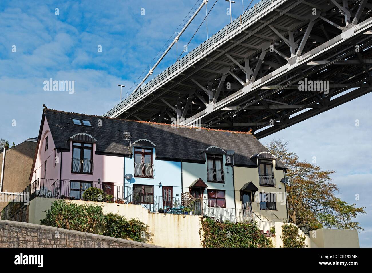 homes built under the royal albert bridge in saltash, cornwall, england Stock Photo