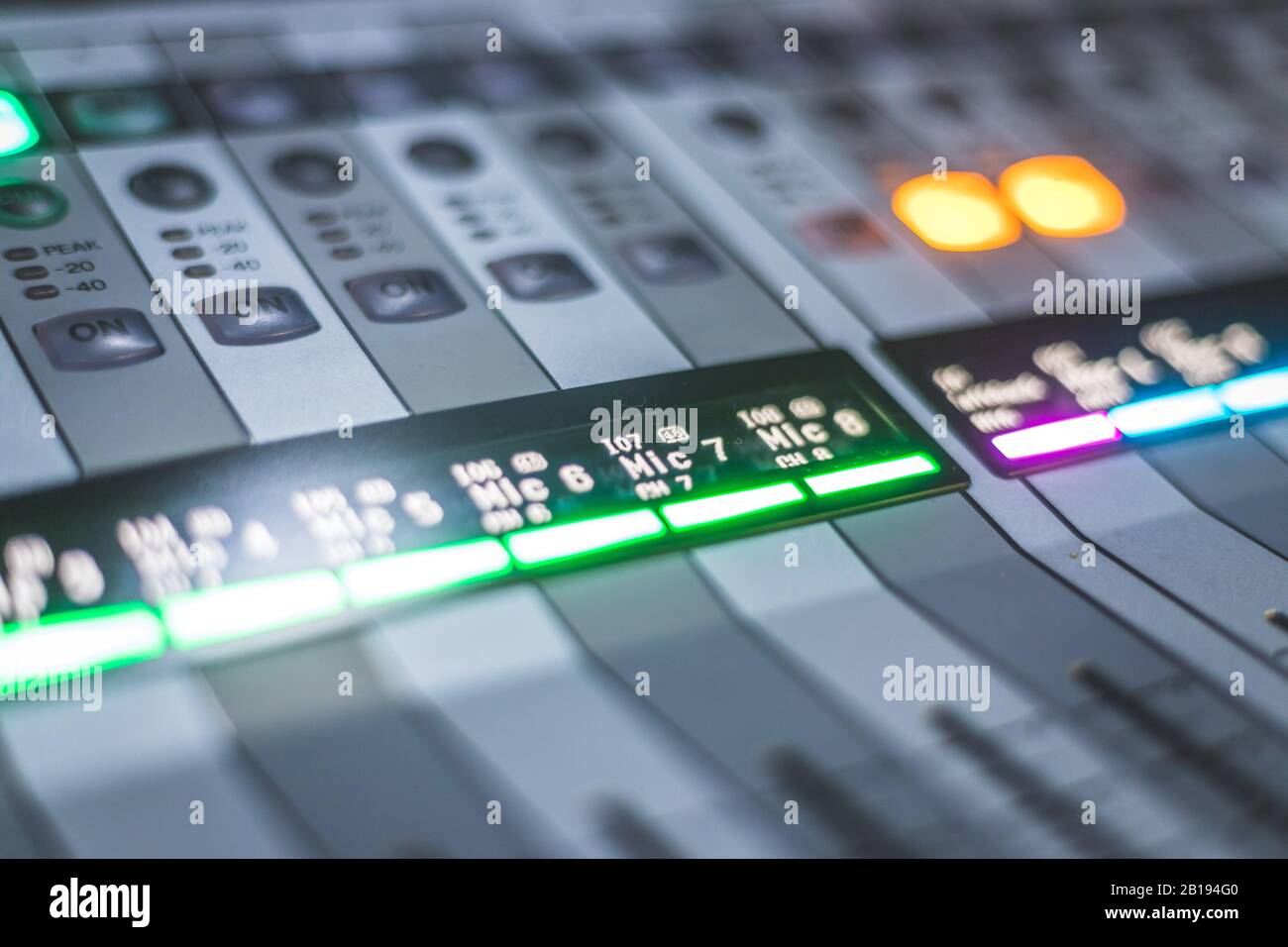 Professional music production in a sound recording studio, mixer desk ...