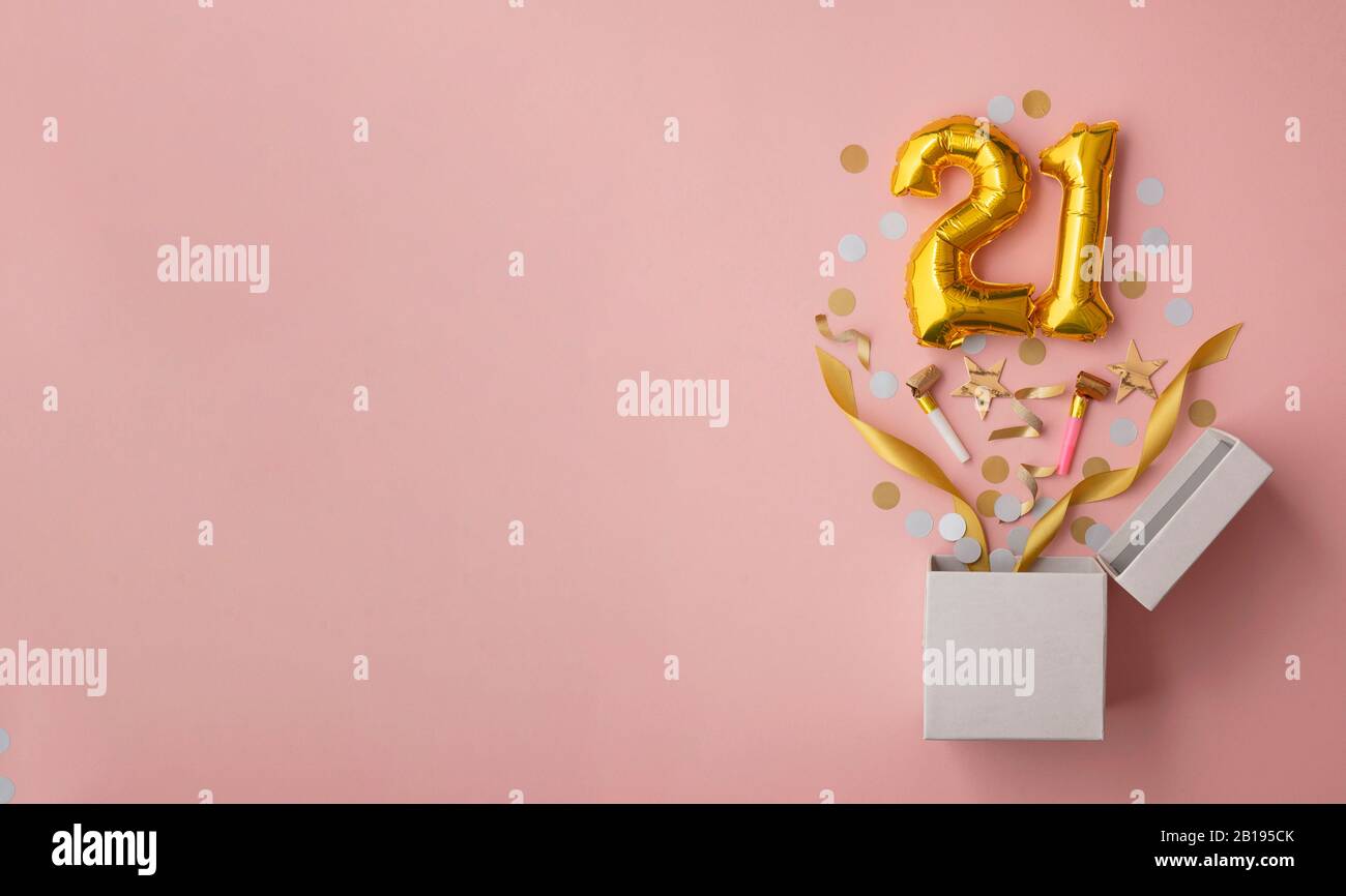 Number 21 birthday balloon celebration gift box lay flat explosion Stock Photo