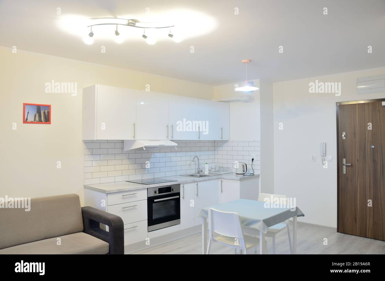 New Apartment With White Kitchenette In Wroclaw Poland Studio