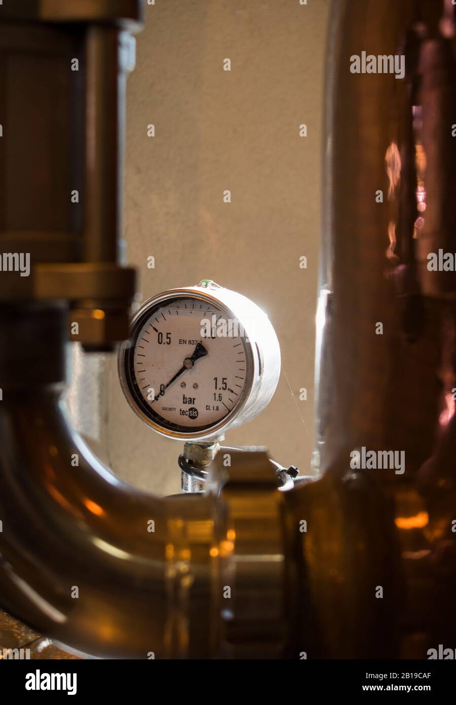 Copper Pot Still and other Equipment used in the process of making artisan gin and whisky at the Cotswold Distillery, Worcestershire, UK Stock Photo