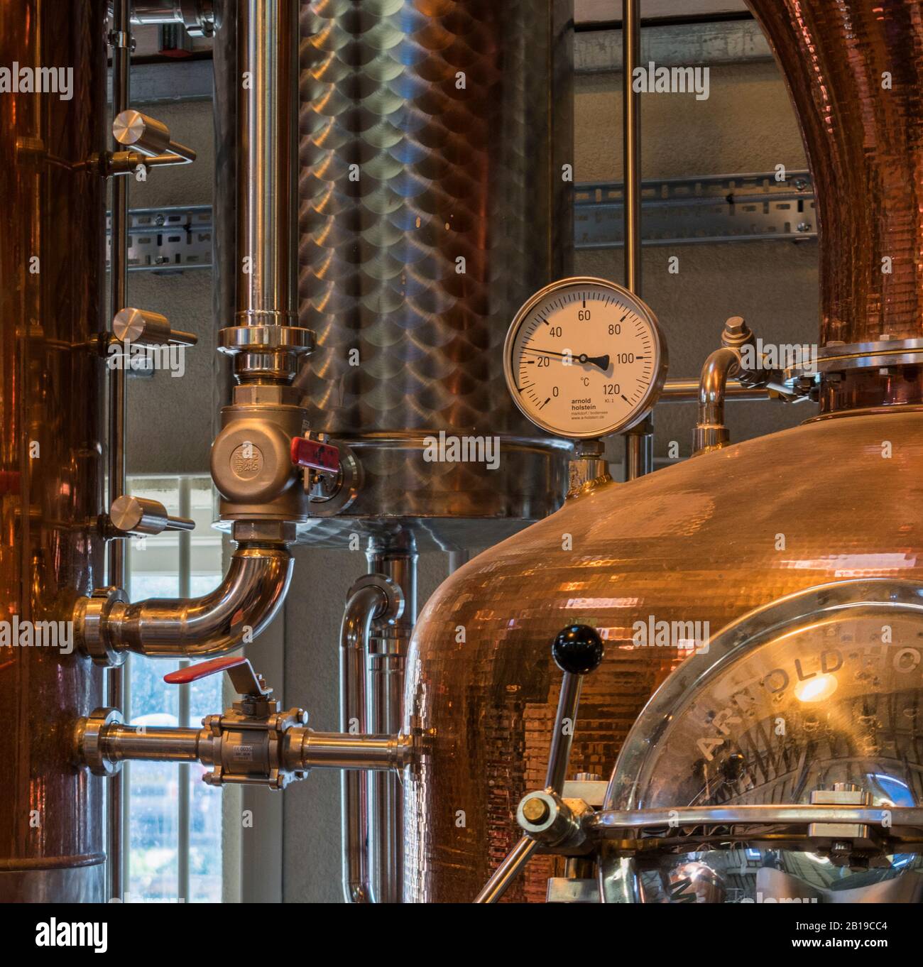 Copper Pot Still and other Equipment used in the process of making artisan gin and whisky at the Cotswold Distillery, Worcestershire, UK Stock Photo