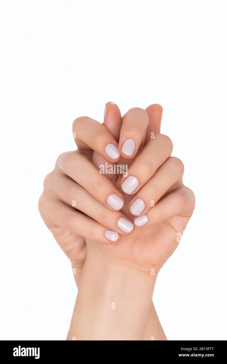 Beautiful female hands isolated on white background Stock Photo