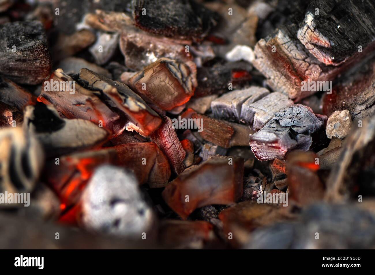 Burning coals in stove for cooking, close up Stock Photo
