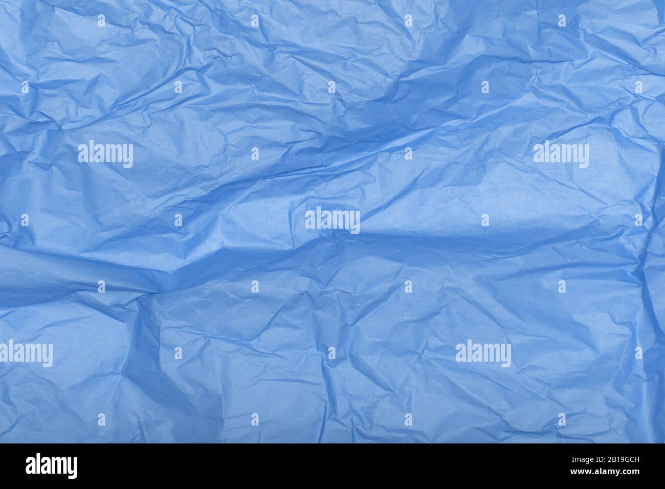 Crumpled blue paper texture as a background Stock Photo