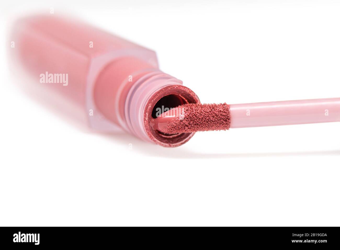 Liquid lipstick. Brush for makeup lips on white background Stock Photo