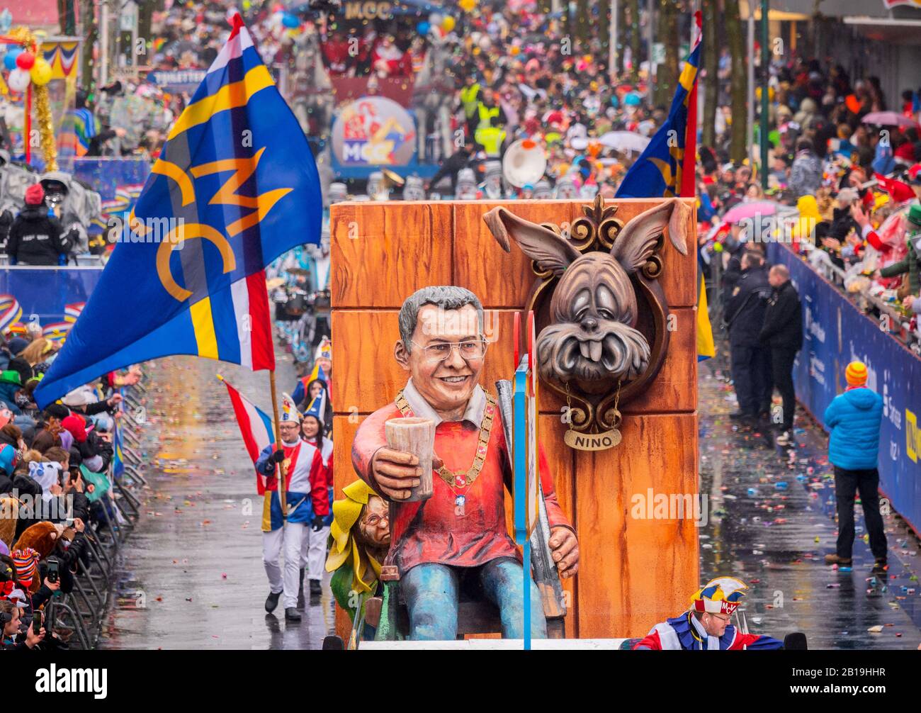 Mainz, Germany. 24th Feb, 2020. A papier-mâché figure depicting Michael Ebling (SPD), mayor of Mainz, drives through the city centre and alludes to the recent election victory of the mayor. The 69th edition of the Rose Monday procession since the Second World War is under the motto 'Humour is Meenzer way of life, paired with heart and tolerance. Credit: Andreas Arnold/dpa/Alamy Live News Stock Photo