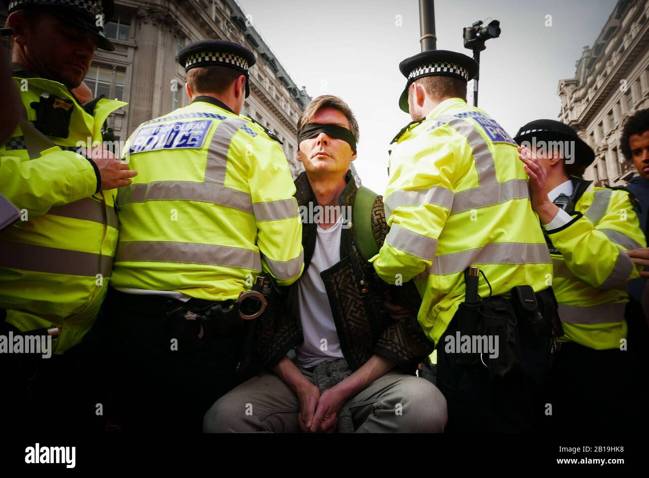 Extinction Rebellion, occupy London: Starting from Monday 15 April 2019, Extinction Rebellion organised demonstrations in London, focusing their attention on Oxford Circus, Marble Arch, Waterloo Bridge and the area around Parliament Square. Activists fixed a pink boat named after murdered Honduran environmental activist Berta Cáceres in the middle of the busy intersection of Oxford Street and Regent Street (Oxford Circus) and glued themselves to it and also set up several gazebos, potted plants and trees, a mobile stage and a skate ramp whilst also occupying Waterloo Bridge (ref:Wikipedia). Stock Photo