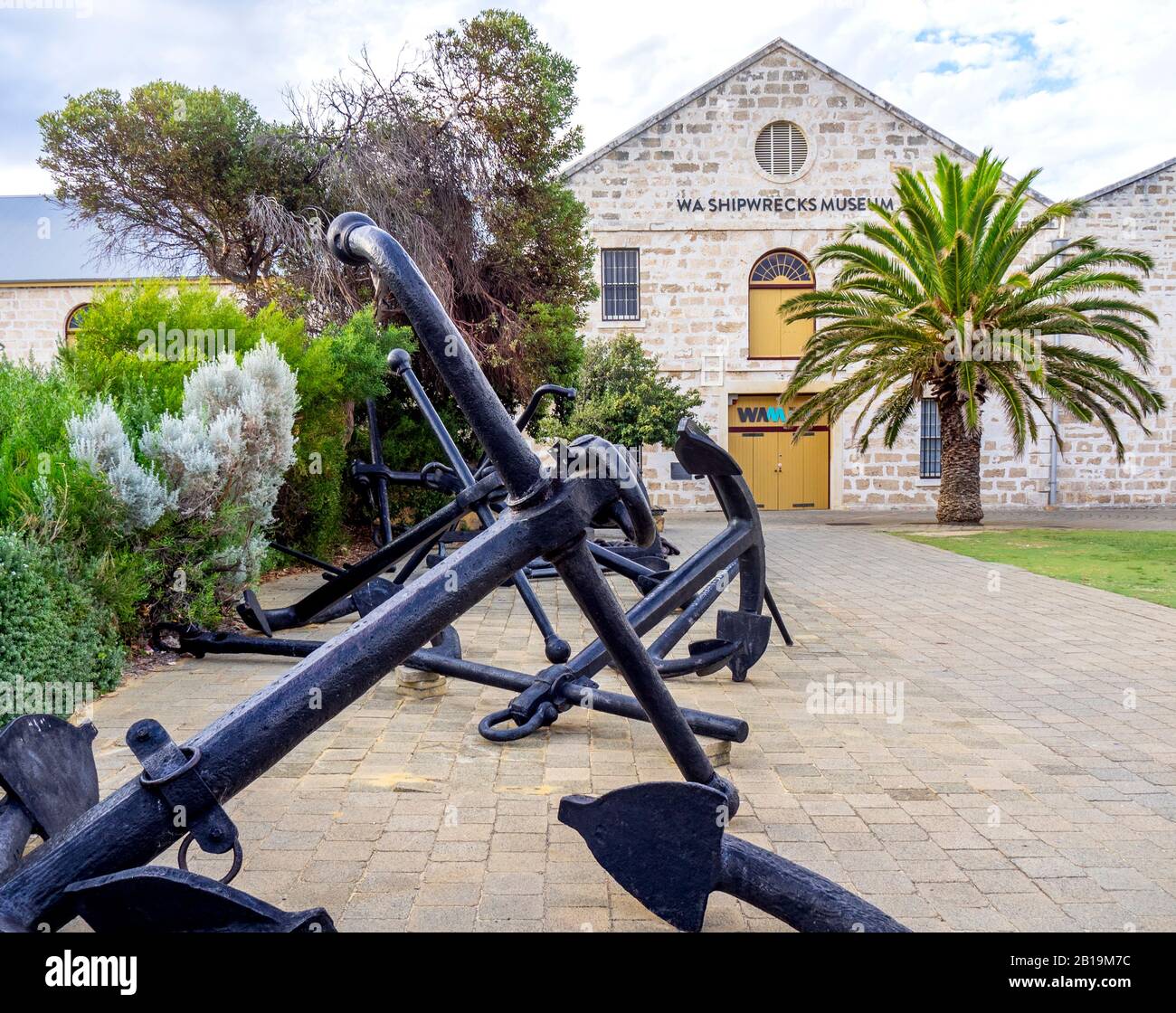 Large anchors outside the WA Shipwrecks Museum housed in convict built limestone buildings in Fremantle Western Australia. Stock Photo