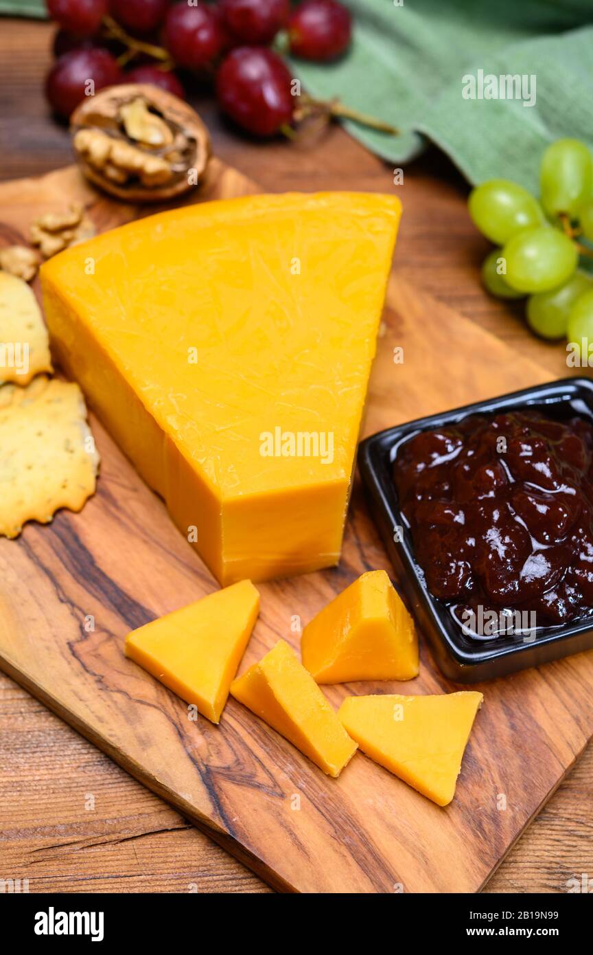 Cheese collection, yellow matured cheddar cheese triangle piece from ...