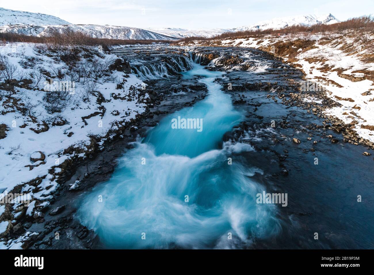 Bruarfoss Waterfall in winter. Beautiful landscape of breathtaking Iceland that is worth it to visit all year long. Tourism in Iceland has its boom Stock Photo