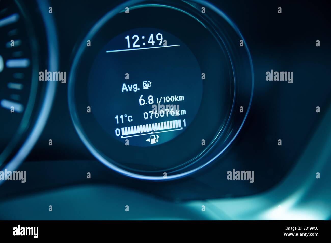 Average fuel usage on the dashboard of modern car Stock Photo Alamy