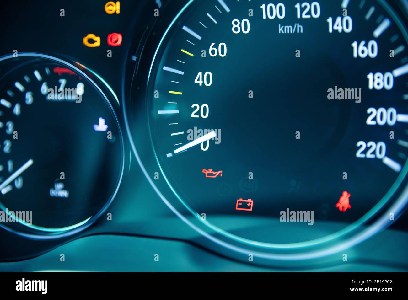 Charging warning light and low oil pressure light on dashboard Stock