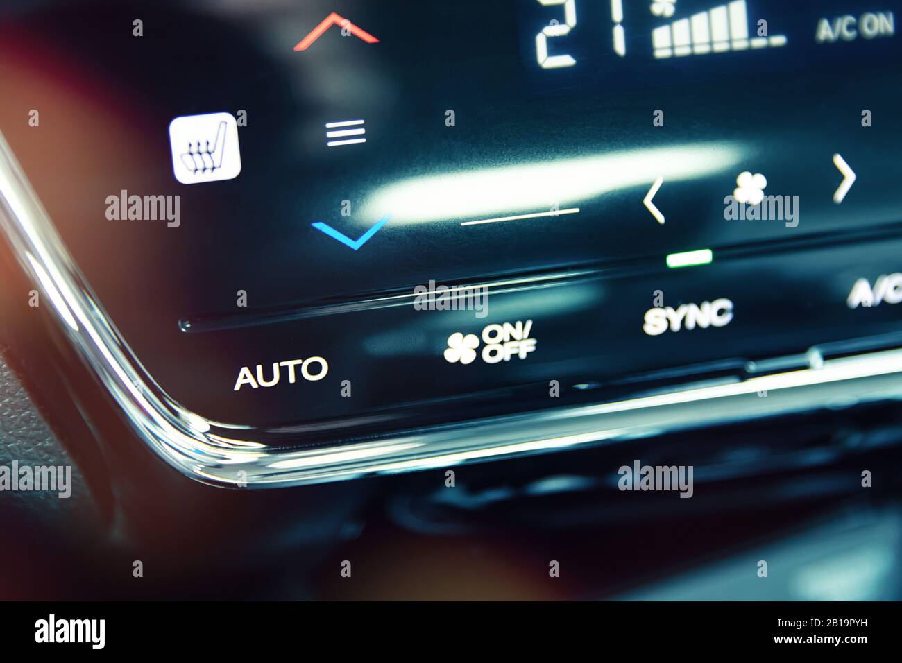 Automatic air conditioning touch panel and close-up to AUTO button Stock Photo