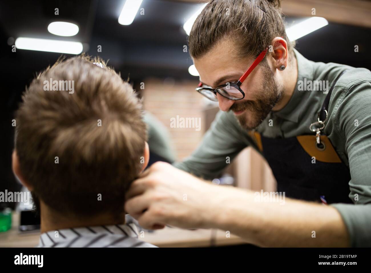 Client during beard and moustache grooming in barber shop Stock Photo Alamy