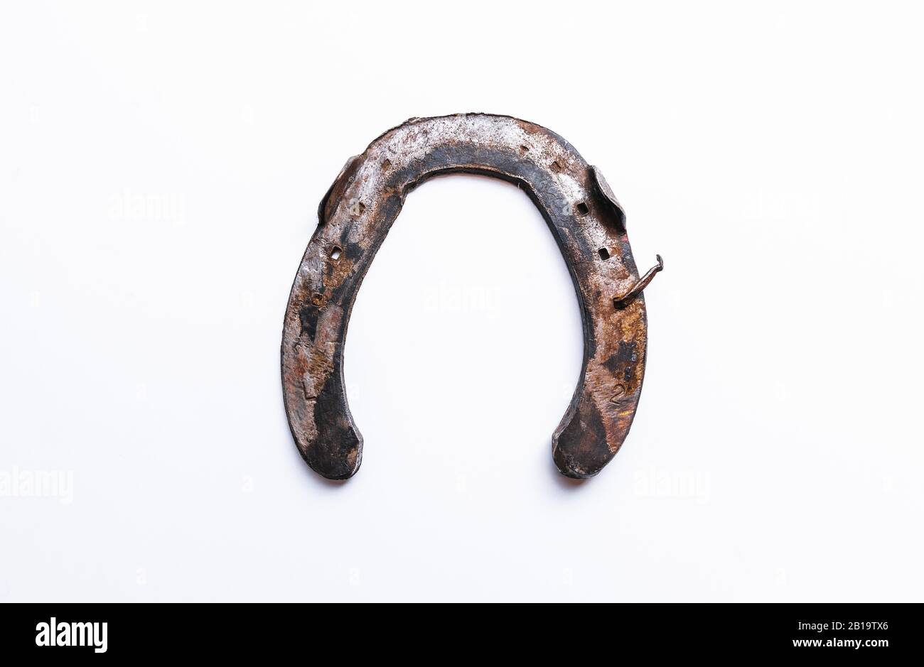 old horseshoe isolated on white background Stock Photo