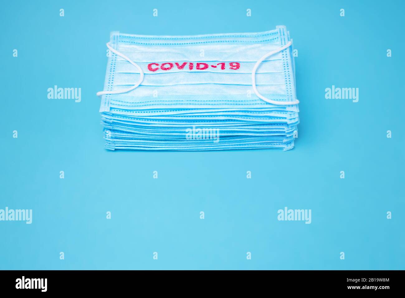 COVID19. Facial masks on the pile. Epidemic background. Shortage of