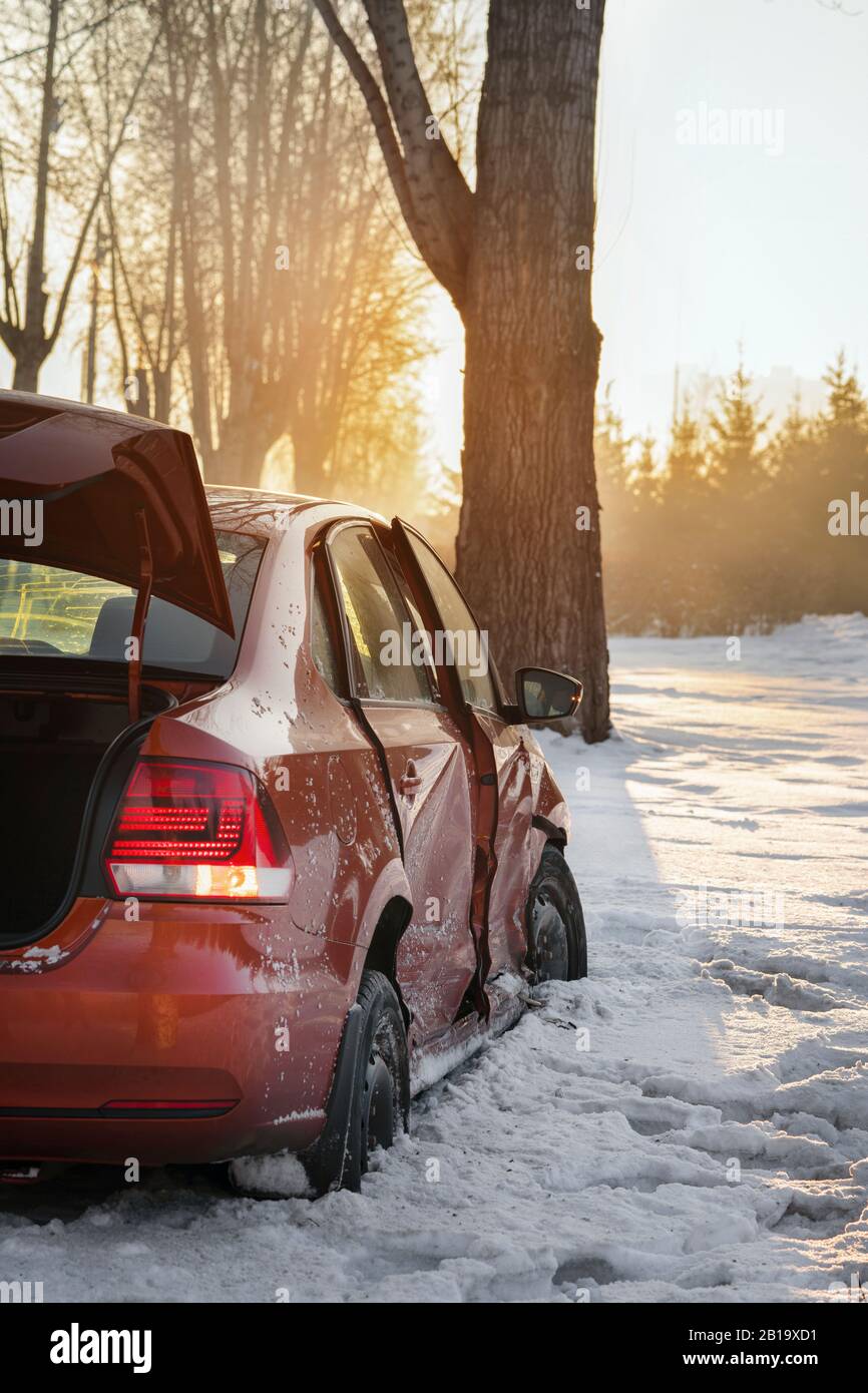 car and ice on the winter road. The car had an accident in the winter ...