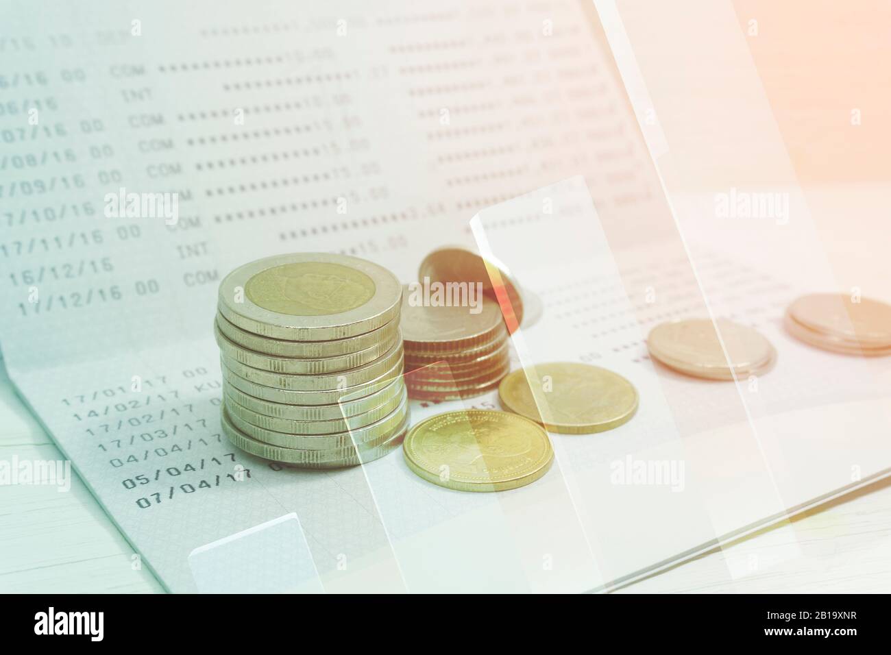 Bar graph coins statement book bank account of double exposure for finance and banking concept