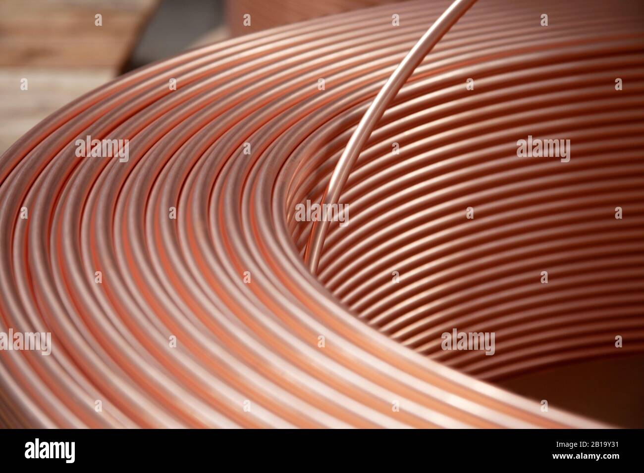 new copper pipes at the factory Stock Photo Alamy