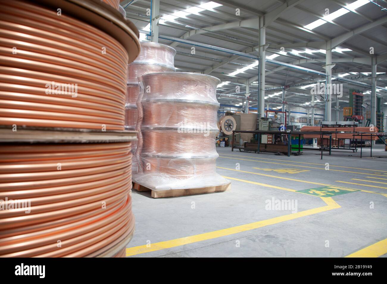 new copper pipes at the factory Stock Photo Alamy