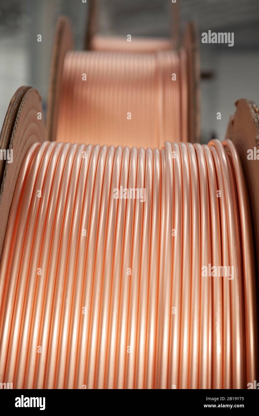 new copper pipes at the factory Stock Photo Alamy