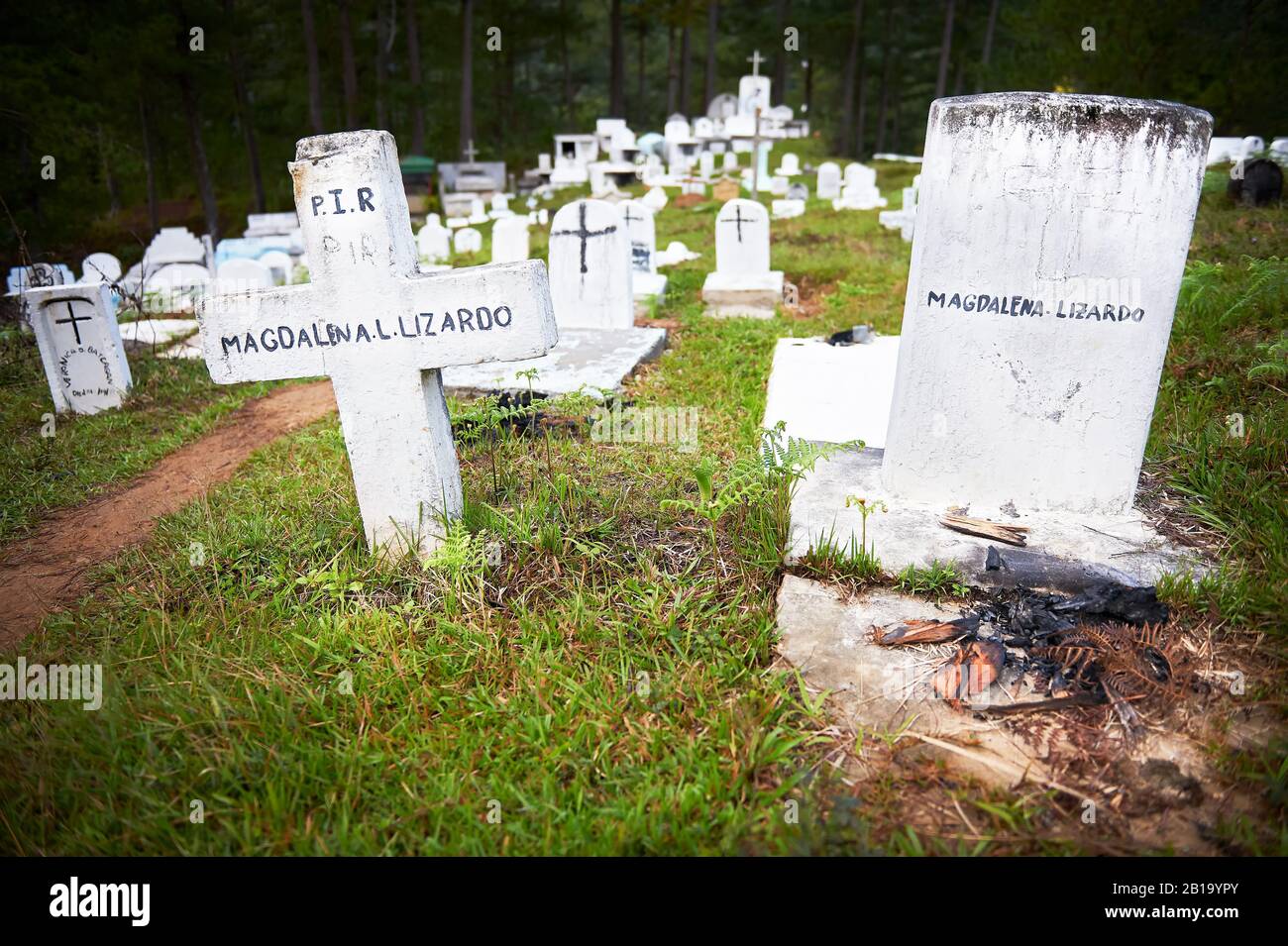 Sagada, Mountain Province, Philippines: Traditional white painted grave stones at the cemetery on a hill close to the town centre Stock Photo