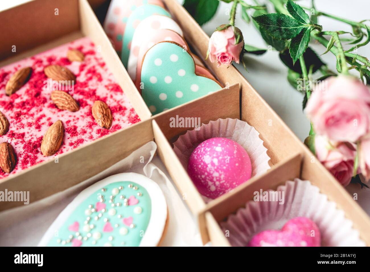 Gift set with hand made sweets in a box on a white table. Stock Photo