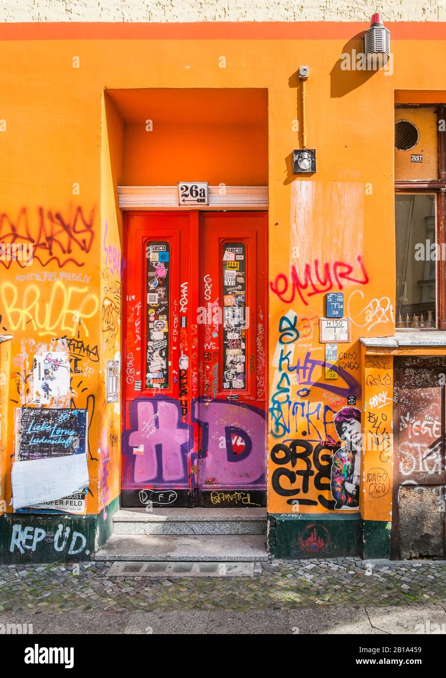 red house door, graffiti, wheatpaste art, Stock Photo